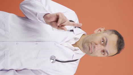 Vertical-video-of-The-doctor-shows-the-correct-sneeze.
